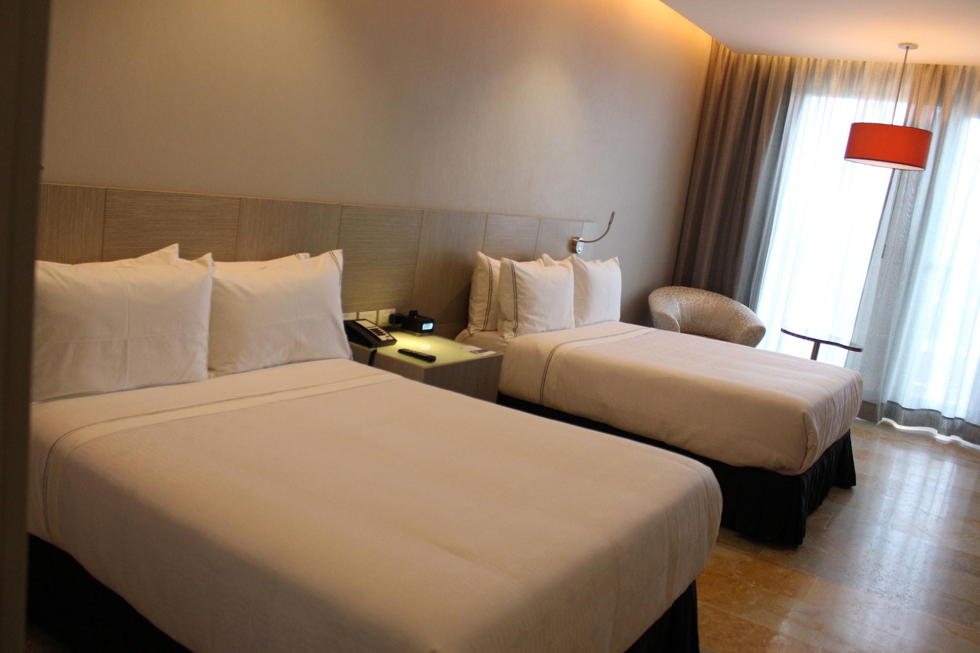 Ghl Hotel Monteria Exterior photo Deluxe room