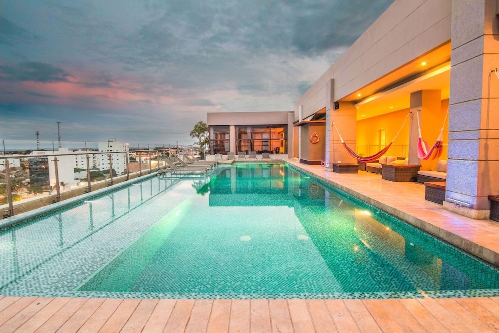 Ghl Hotel Monteria Exterior photo Rooftop pool at the hotel