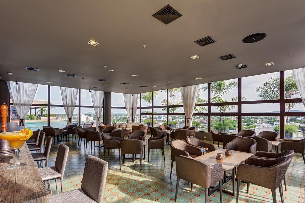 Ghl Hotel Monteria Exterior photo The restaurant